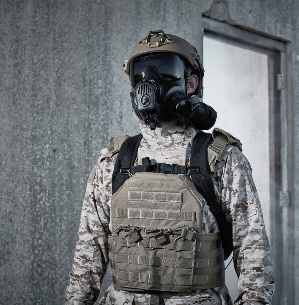 Soldier wearing a helmet and respirator